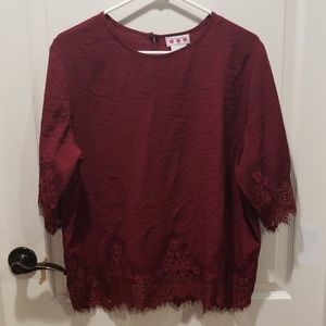 Dressy top with lace embellishments